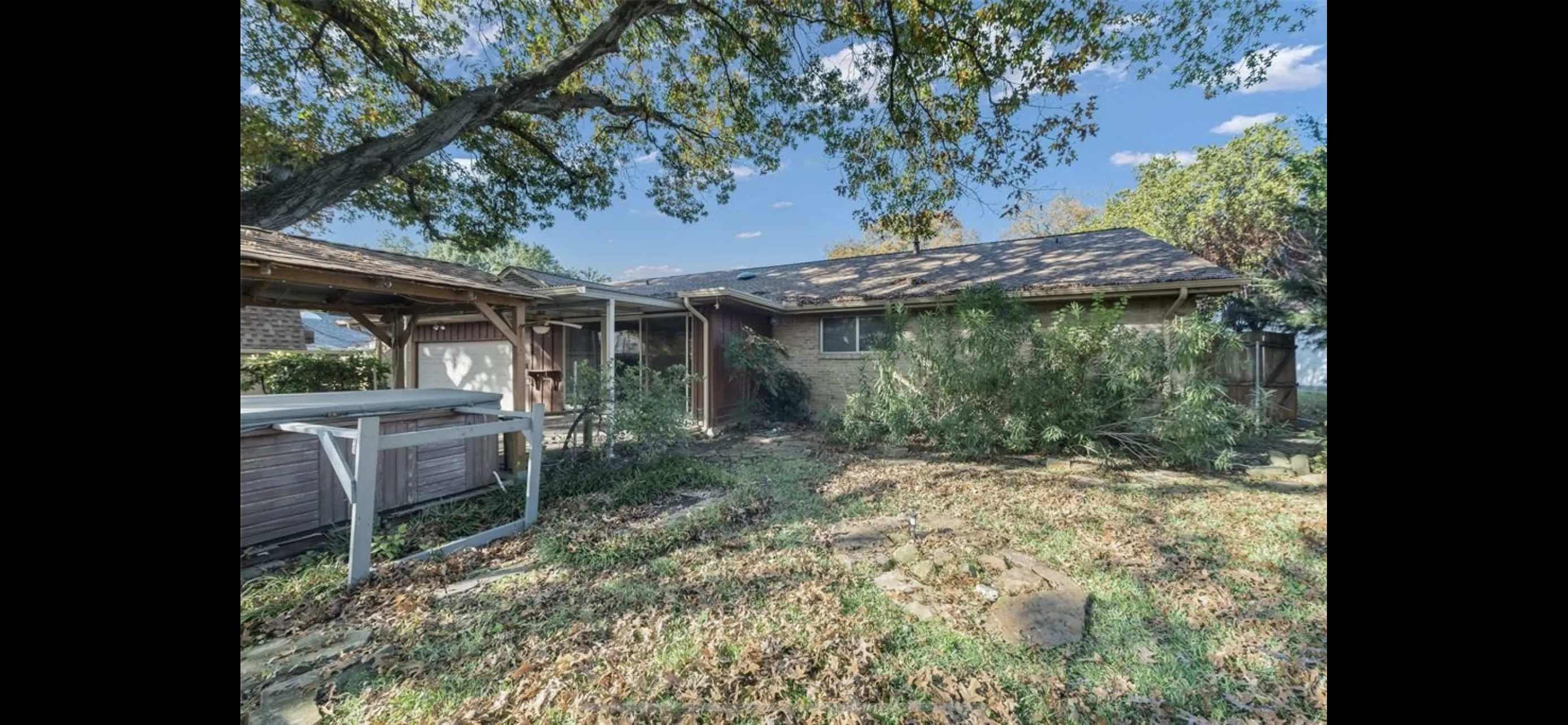 Rear elevation before a whole home renovation in Dallas